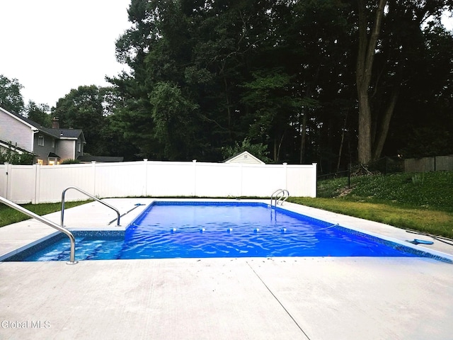 33 Cindy Ln, Halfmoon, NY 12065 - view of pool with a fenced backyard, a patio area, and view of scattered trees