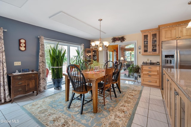 271 Settles Mountain Rd, Cobleskill, NY 12043 - dining space featuring light tile patterned floors and a chandelier