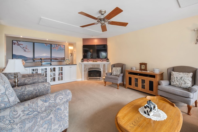 271 Settles Mountain Rd, Cobleskill, NY 12043 - living area with ceiling fan, carpet floors, and a high end fireplace