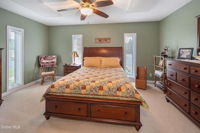 271 Settles Mountain Rd, Cobleskill, NY 12043 - bedroom featuring light colored carpet, multiple windows, and ceiling fan