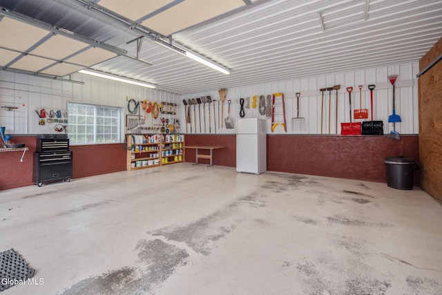 271 Settles Mountain Rd, Cobleskill, NY 12043 - garage with freestanding refrigerator