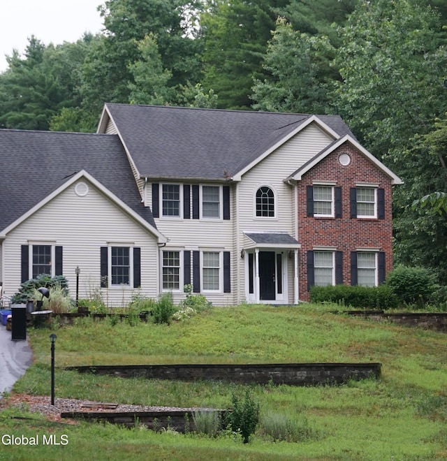 3 Stone Clover Dr, Stillwater, NY 12866 - colonial house with a shingled roof and a front yard