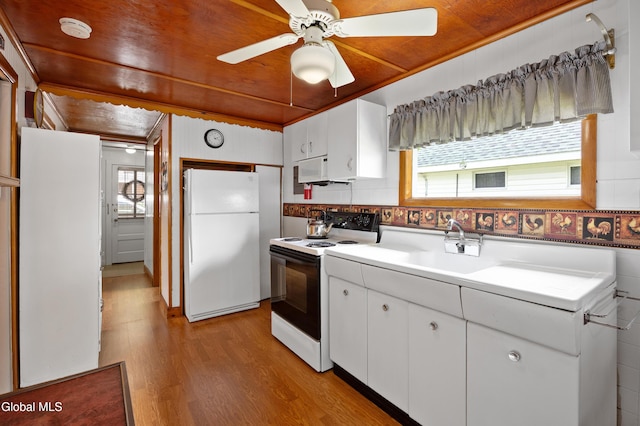15 Fathom Dr, Stillwater, NY 12866 - kitchen featuring white appliances, plenty of natural light, light wood finished floors, and white cabinetry