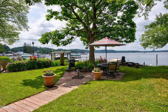 15 Fathom Dr, Stillwater, NY 12866 - view of green lawn with a water view and a patio area