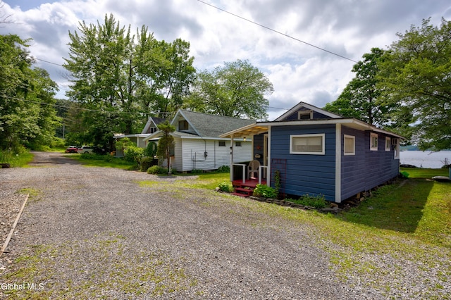 15 Fathom Dr, Stillwater, NY 12866 - bungalow-style house with gravel driveway