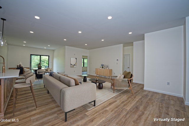 145C Bozenkill Rd, Altamont, NY 12009 - living room featuring light wood-style flooring and recessed lighting