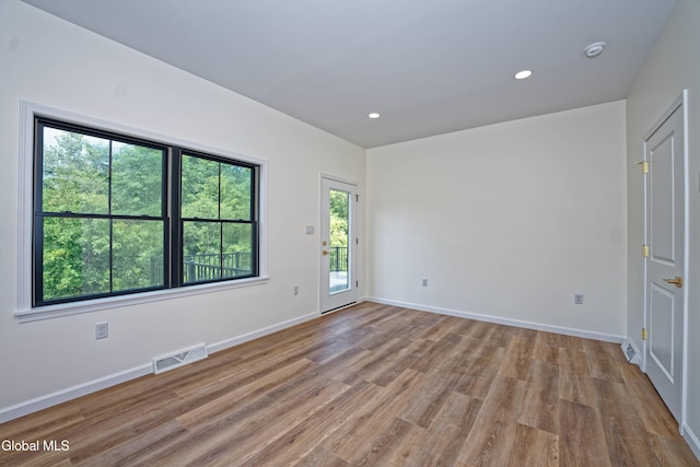 145C Bozenkill Rd, Altamont, NY 12009 - spare room with light wood-type flooring, plenty of natural light, recessed lighting, and a smoke detector