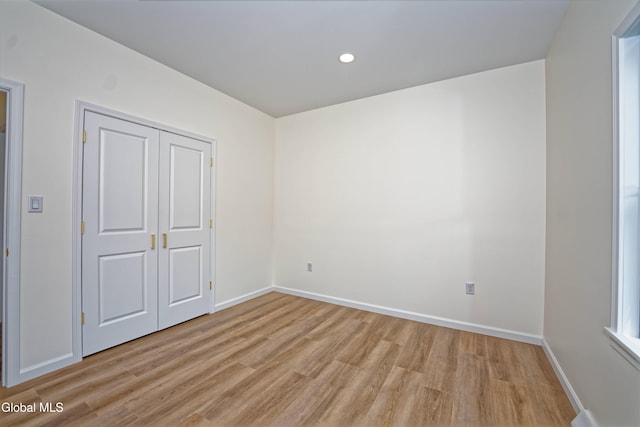 145C Bozenkill Rd, Altamont, NY 12009 - unfurnished bedroom with light wood-style flooring, recessed lighting, and a closet