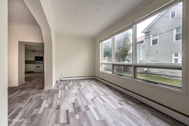 128 Circular St, Saratoga Springs, NY 12866 - empty room with crown molding and wood finished floors