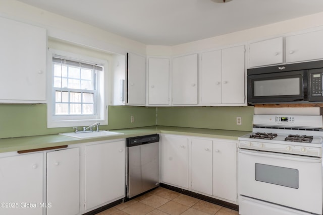 128 Circular St, Saratoga Springs, NY 12866 - kitchen with white gas range, dishwasher, black microwave, and white cabinetry