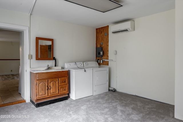 128 Circular St, Saratoga Springs, NY 12866 - laundry area featuring a wall unit AC, washer and clothes dryer, cabinet space, and light carpet