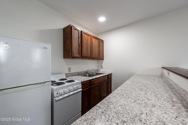 128 Circular St, Saratoga Springs, NY 12866 - kitchen featuring white appliances and light countertops