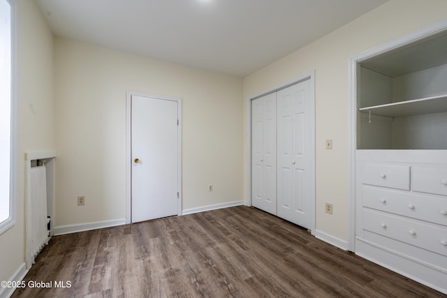 128 Circular St, Saratoga Springs, NY 12866 - unfurnished bedroom featuring wood finished floors