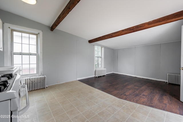 128 Circular St, Saratoga Springs, NY 12866 - unfurnished living room with radiator heating unit, beamed ceiling, and light wood-type flooring