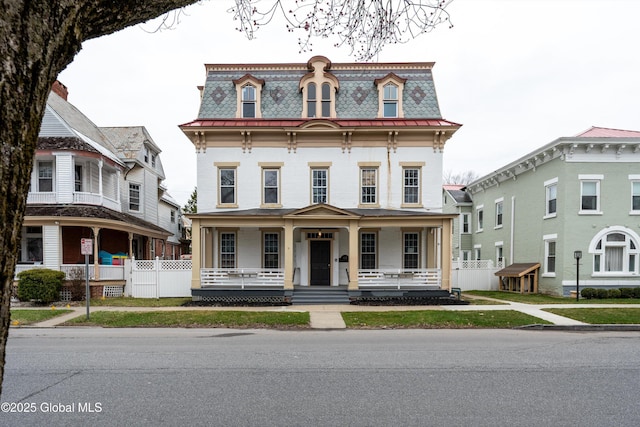 128 Circular St, Saratoga Springs, NY 12866 - second empire-style home featuring mansard roof, a porch, and a high end roof