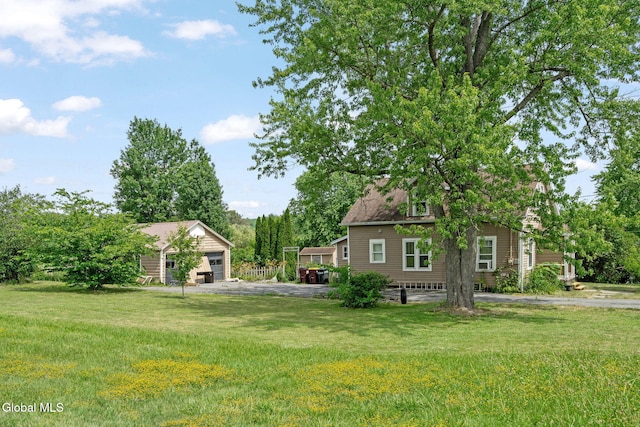152 Charleston St, Esperance, NY 12066 - view of green lawn with a detached garage