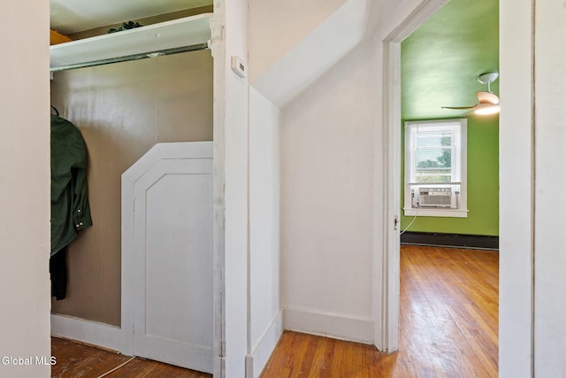 152 Charleston St, Esperance, NY 12066 - laundry area featuring cooling unit, hardwood / wood-style floors, and a baseboard heating unit