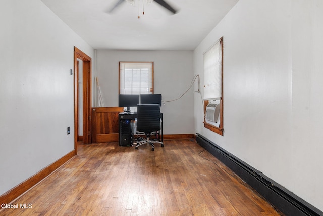 152 Charleston St, Esperance, NY 12066 - home office with a baseboard heating unit, wood-type flooring, a ceiling fan, and cooling unit