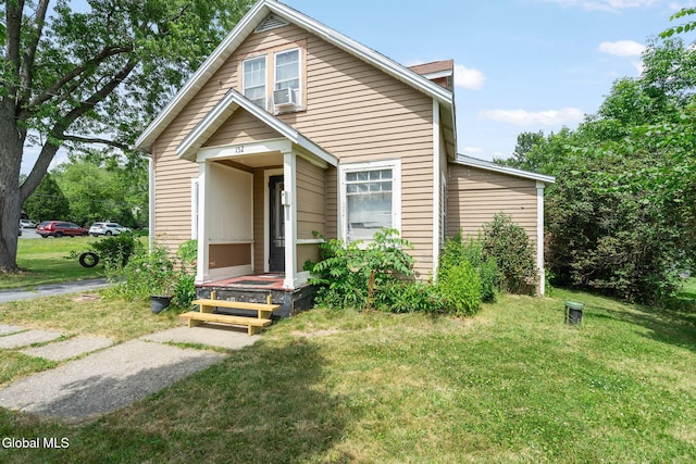 152 Charleston St, Esperance, NY 12066 - bungalow with a front yard and cooling unit