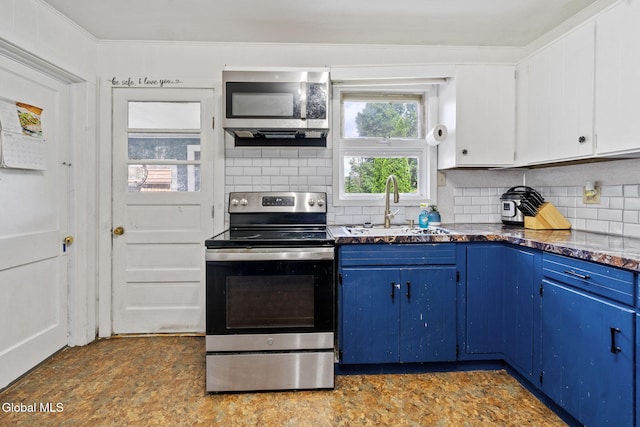 152 Charleston St, Esperance, NY 12066 - kitchen featuring stainless steel appliances, blue cabinetry, tasteful backsplash, and crown molding
