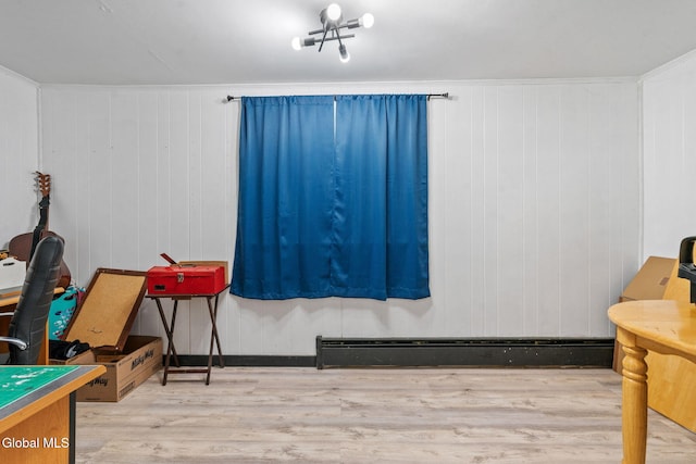 152 Charleston St, Esperance, NY 12066 - recreation room with wood finished floors and baseboard heating