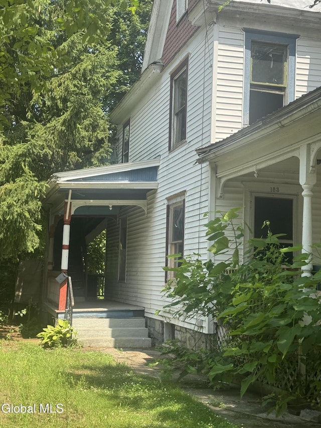 183 Main St, South Glens Falls, NY 12803 - view of side of home with covered porch