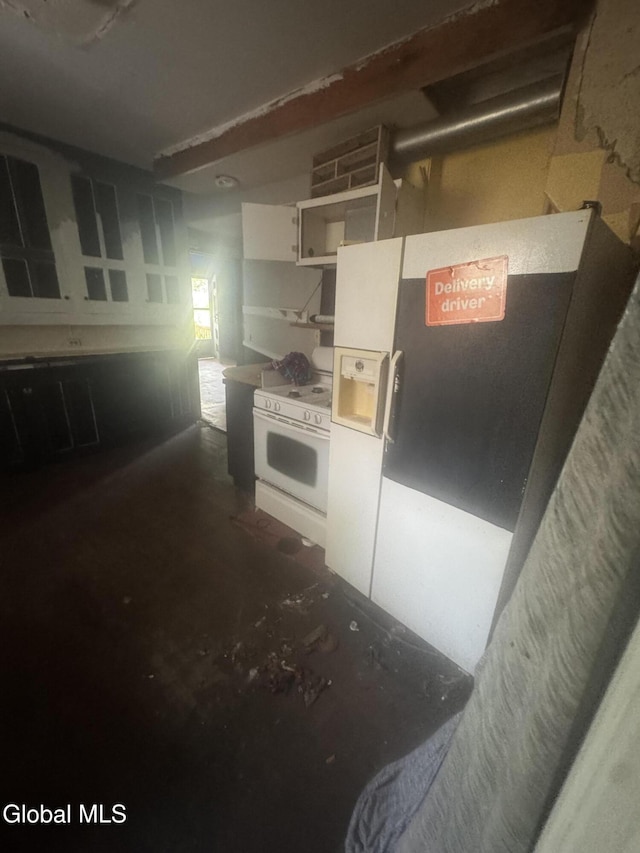 183 Main St, South Glens Falls, NY 12803 - kitchen featuring white range with gas stovetop, white cabinets, concrete flooring, and open shelves