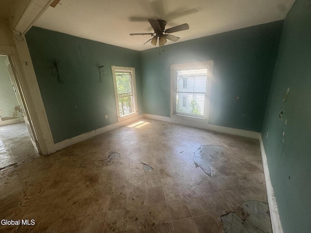183 Main St, South Glens Falls, NY 12803 - unfurnished room with baseboards and ceiling fan