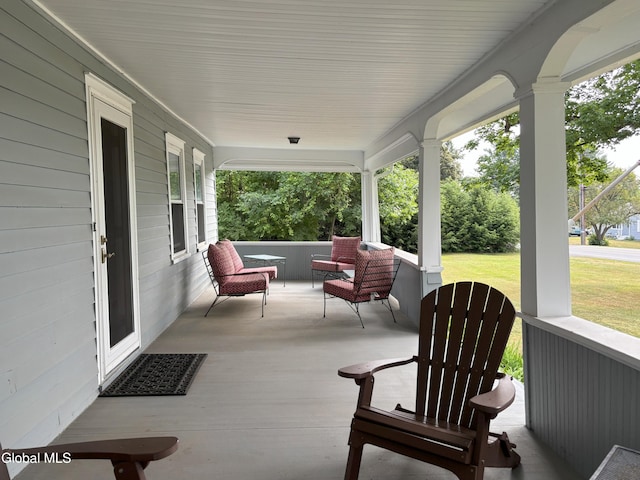 576 County Highway 102, Gloversville, NY 12078 - covered porch featuring a lawn