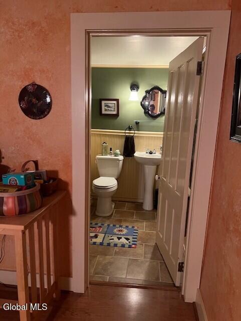 576 County Highway 102, Gloversville, NY 12078 - half bathroom with toilet and wainscoting