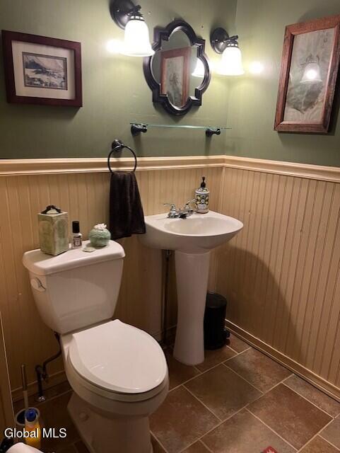 576 County Highway 102, Gloversville, NY 12078 - half bath with wainscoting and tile patterned floors