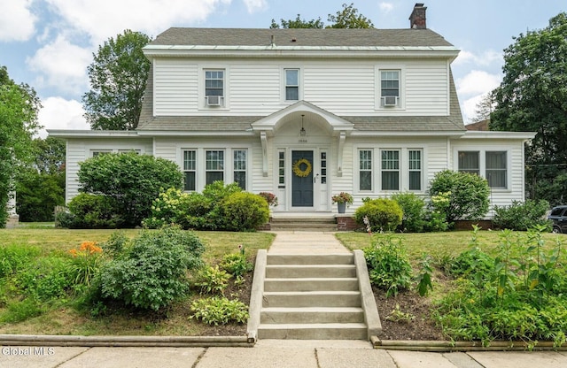 1556 Wendell Ave, Schenectady, NY 12308 - view of front facade with a chimney and a front lawn