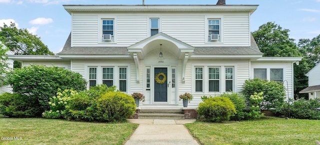 1556 Wendell Ave, Schenectady, NY 12308 - view of front facade featuring a front lawn, a chimney, and a shingled roof