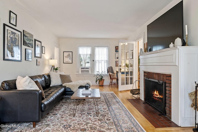 1556 Wendell Ave, Schenectady, NY 12308 - living room featuring a fireplace and wood finished floors