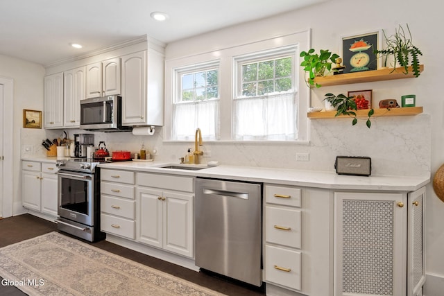 1556 Wendell Ave, Schenectady, NY 12308 - kitchen with plenty of natural light, stainless steel appliances, open shelves, decorative backsplash, and recessed lighting