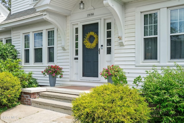 1556 Wendell Ave, Schenectady, NY 12308 - doorway to property featuring roof with shingles
