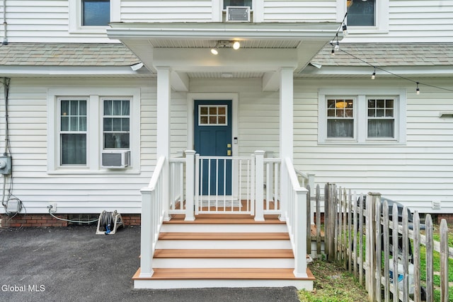 1556 Wendell Ave, Schenectady, NY 12308 - view of exterior entry with roof with shingles and cooling unit