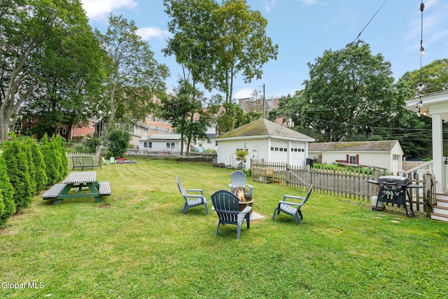 1556 Wendell Ave, Schenectady, NY 12308 - view of yard with an outbuilding, a garage, and a fire pit