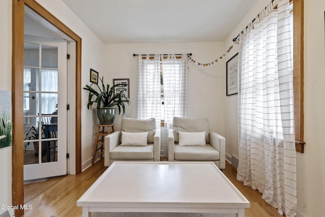 1556 Wendell Ave, Schenectady, NY 12308 - sitting room with plenty of natural light and light wood-type flooring