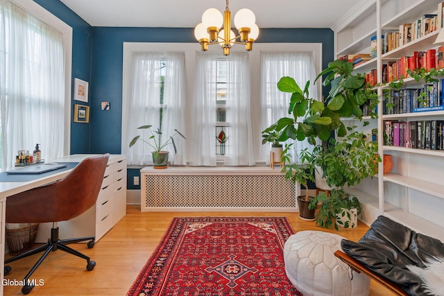1556 Wendell Ave, Schenectady, NY 12308 - office with radiator, a chandelier, and light wood-style floors