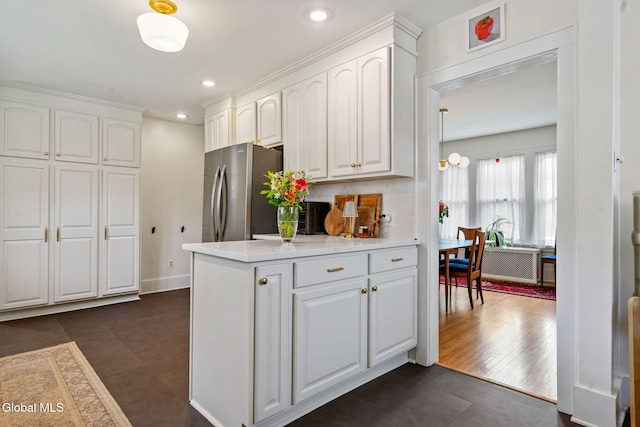 1556 Wendell Ave, Schenectady, NY 12308 - kitchen featuring freestanding refrigerator, white cabinetry, light countertops, and recessed lighting