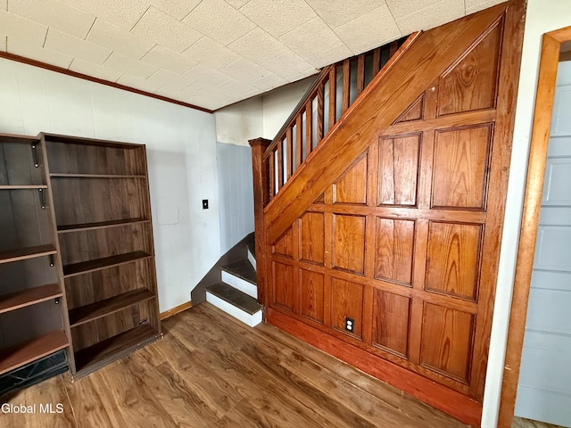 74 Park St, Gloversville, NY 12078 - stairway featuring wood finished floors