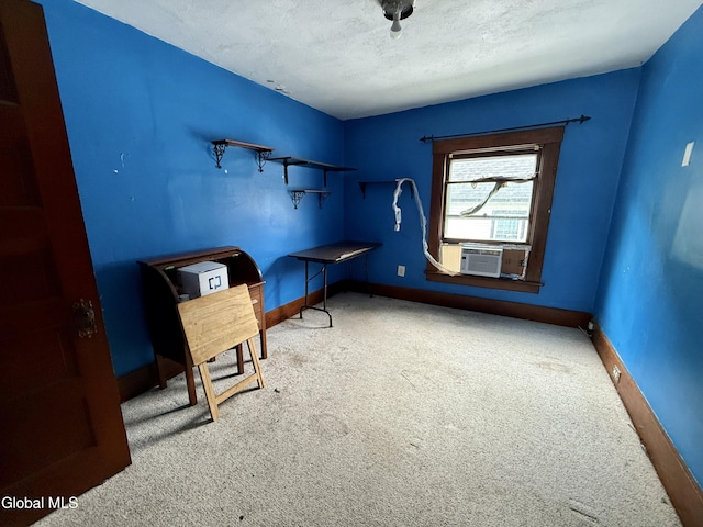 74 Park St, Gloversville, NY 12078 - unfurnished office featuring carpet flooring, cooling unit, and a textured ceiling