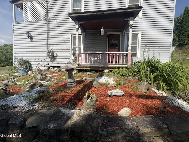 5 Spring St, Port Henry, NY 12974 - back of house with a porch