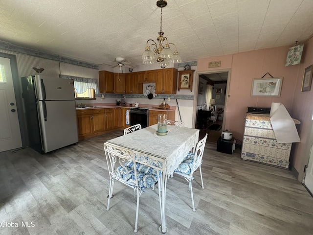 5 Spring St, Port Henry, NY 12974 - dining area with light wood-style flooring and a chandelier