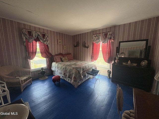5 Spring St, Port Henry, NY 12974 - bedroom featuring wood-type flooring and access to outside