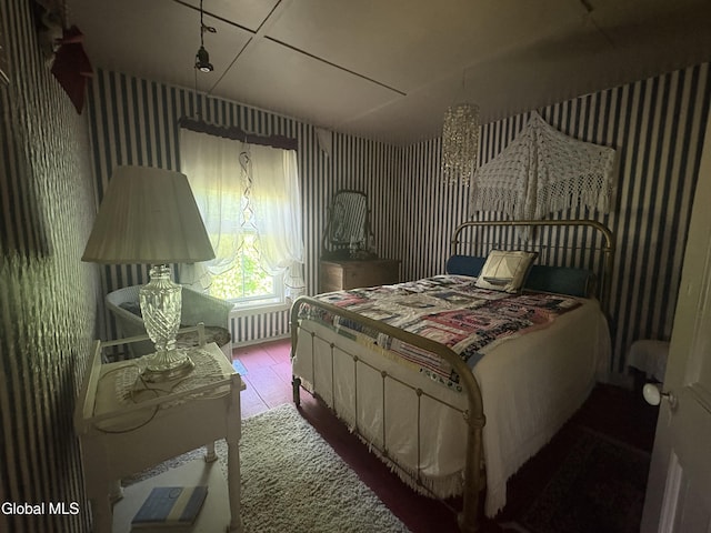 5 Spring St, Port Henry, NY 12974 - bedroom featuring wallpapered walls and wood finished floors