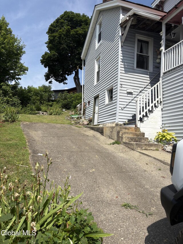 5 Spring St, Port Henry, NY 12974 - view of property exterior with stairway