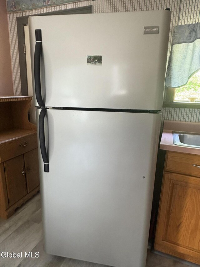 5 Spring St, Port Henry, NY 12974 - laundry room with wallpapered walls