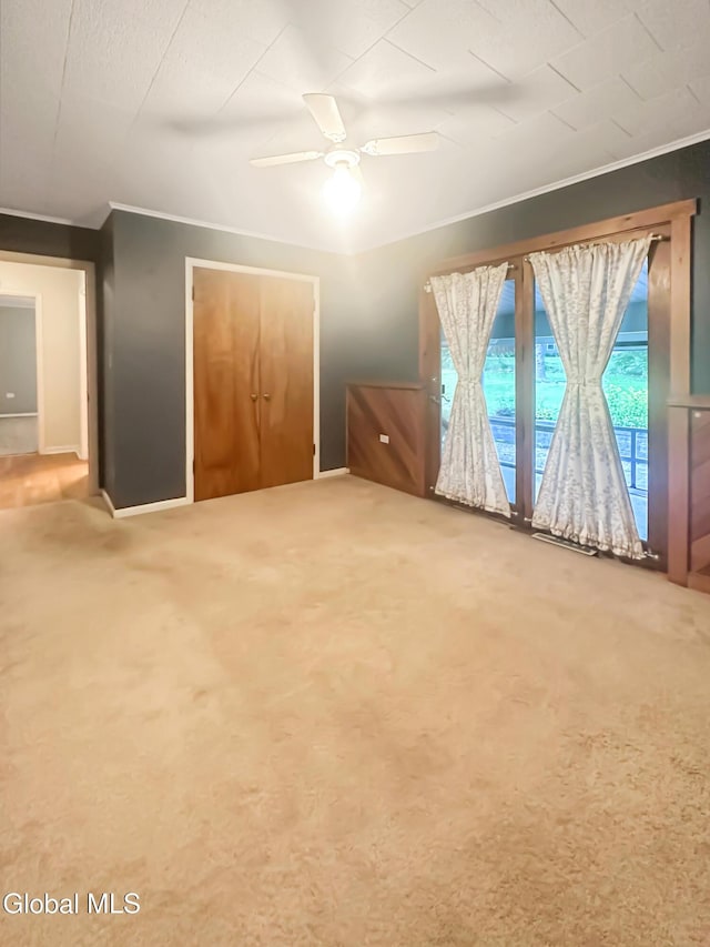 32 Abeling St, Canajoharie, NY 13317 - unfurnished bedroom featuring ornamental molding, carpet flooring, and ceiling fan